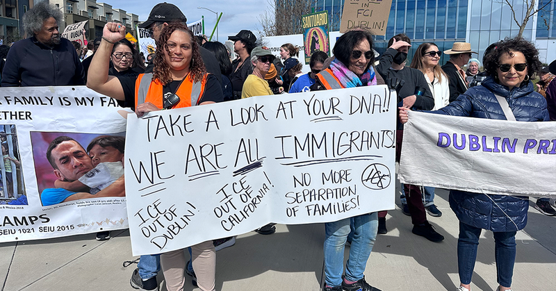 PJ's Reentry coordinator Sol at an event organizing against reopening the Dublin prison as an ICE site.